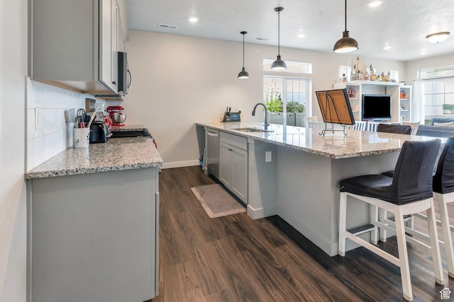 24 S Baker Spring Cv, Saratoga Springs, UT 84045 - kitchen featuring a sink, gray cabinets, appliances with stainless steel finishes, plenty of natural light, and recessed lighting