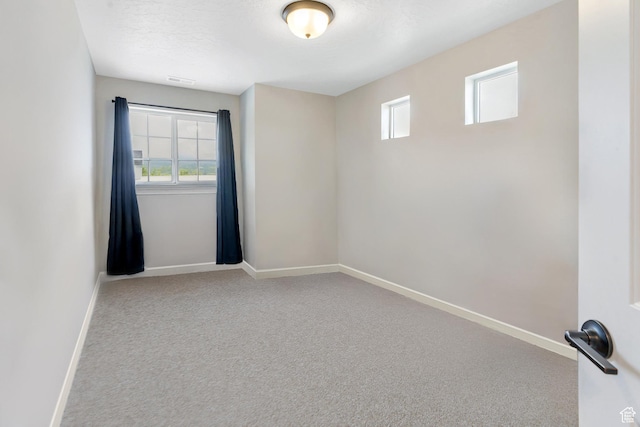 24 S Baker Spring Cv, Saratoga Springs, UT 84045 - empty room with baseboards and carpet floors
