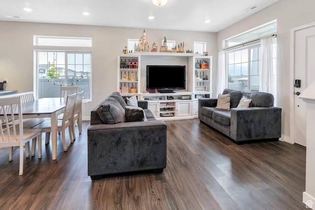 24 S Baker Spring Cv, Saratoga Springs, UT 84045 - living room featuring healthy amount of natural light, dark wood finished floors, baseboards, and recessed lighting