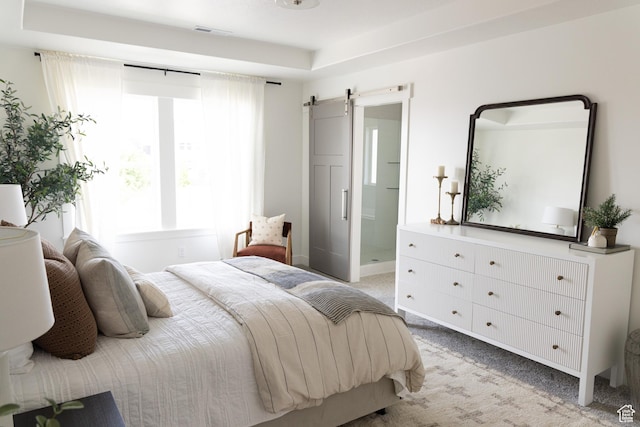 6489 W Yawkey Way, Herriman, UT 84096 - bedroom featuring light colored carpet, a barn door, and connected bathroom