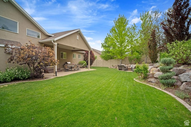 view of yard with outdoor lounge area and a patio
