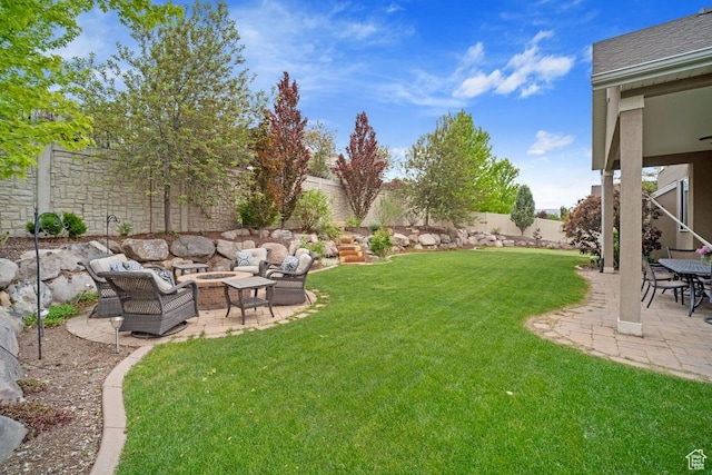 view of yard with outdoor lounge area and a patio area