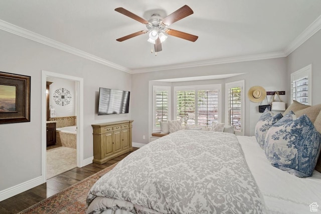 bedroom featuring ornamental molding, dark wood finished floors, baseboards, ceiling fan, and ensuite bathroom