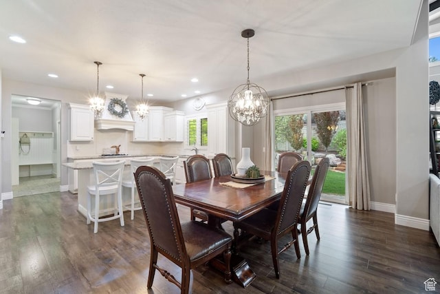 dining space featuring a chandelier, dark wood-style flooring, baseboards, and recessed lighting