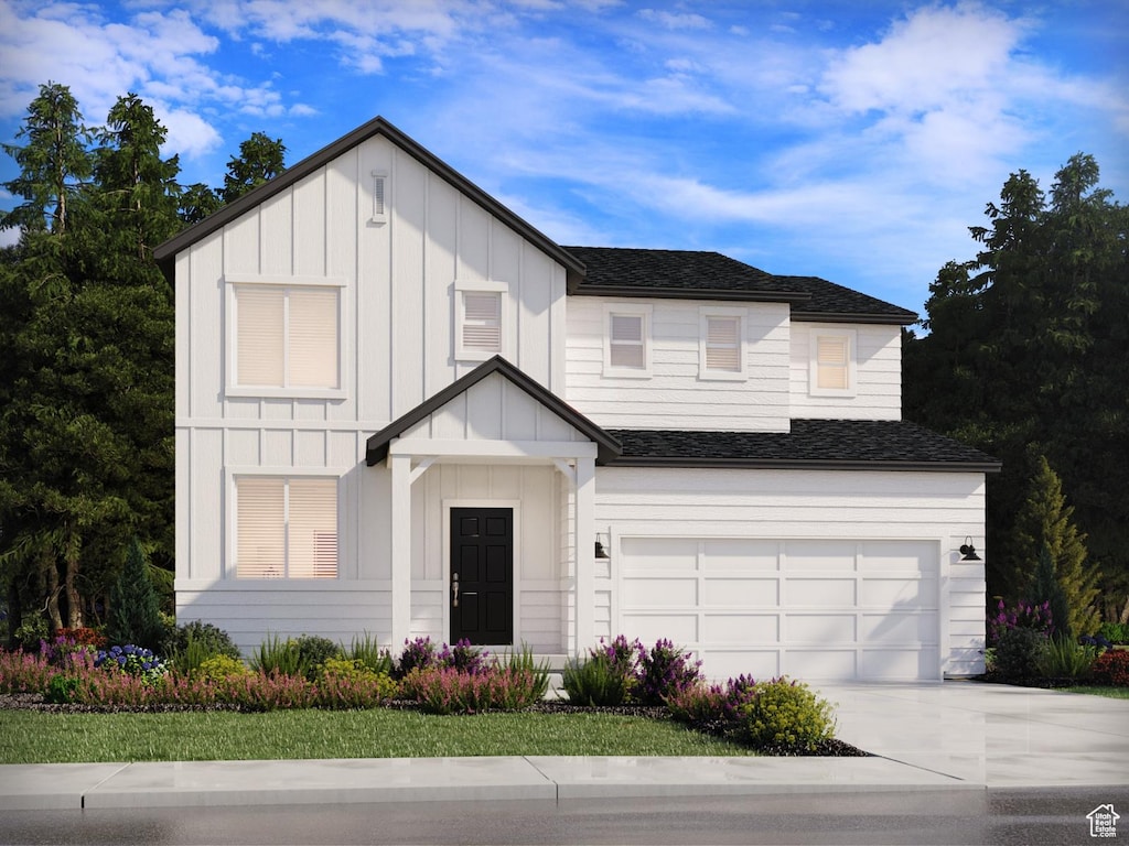 3457 S 3100 W Unit 174, West Haven, UT 84401 - view of front facade with a garage, board and batten siding, concrete driveway, and a shingled roof