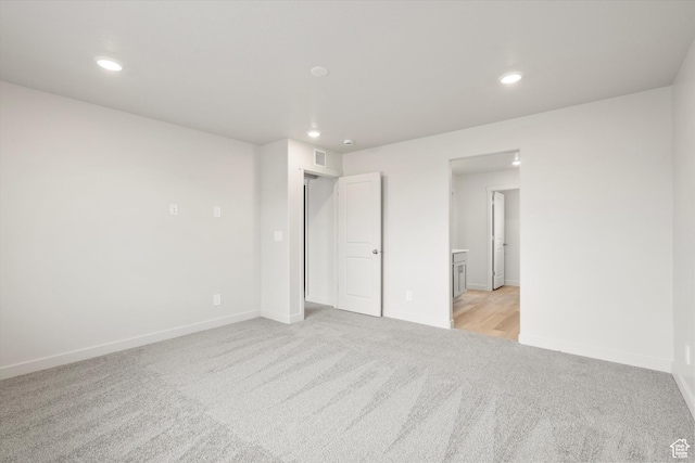 3457 S 3100 W Unit 174, West Haven, UT 84401 - unfurnished bedroom with light colored carpet and recessed lighting