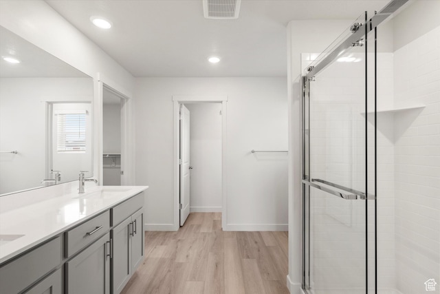 3457 S 3100 W Unit 174, West Haven, UT 84401 - full bath featuring a shower stall, wood finished floors, double vanity, and recessed lighting