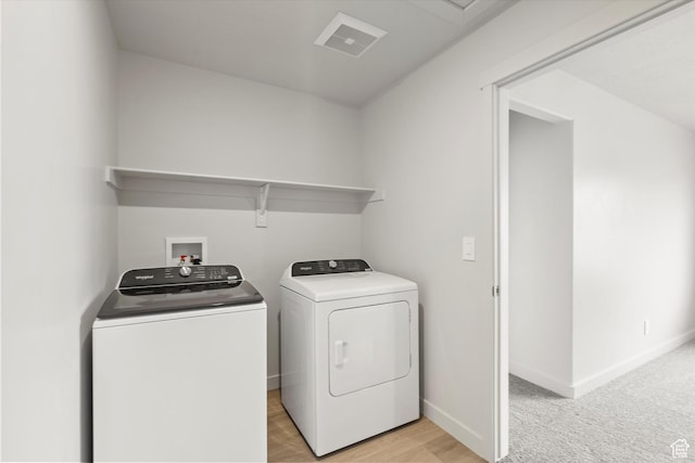 3457 S 3100 W Unit 174, West Haven, UT 84401 - laundry room with washer and dryer and light wood-type flooring