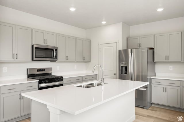 3457 S 3100 W Unit 174, West Haven, UT 84401 - kitchen with stainless steel appliances, gray cabinets, light wood-style flooring, recessed lighting, and light countertops