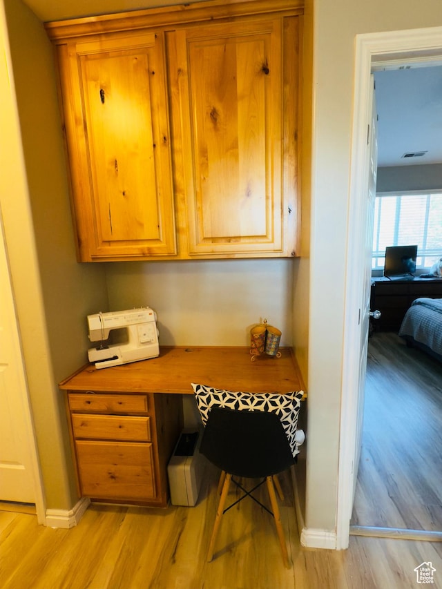 4382 N Pheasant Ridge Trl, Lehi, UT 84043 - office with built in desk, light wood-style flooring, and baseboards