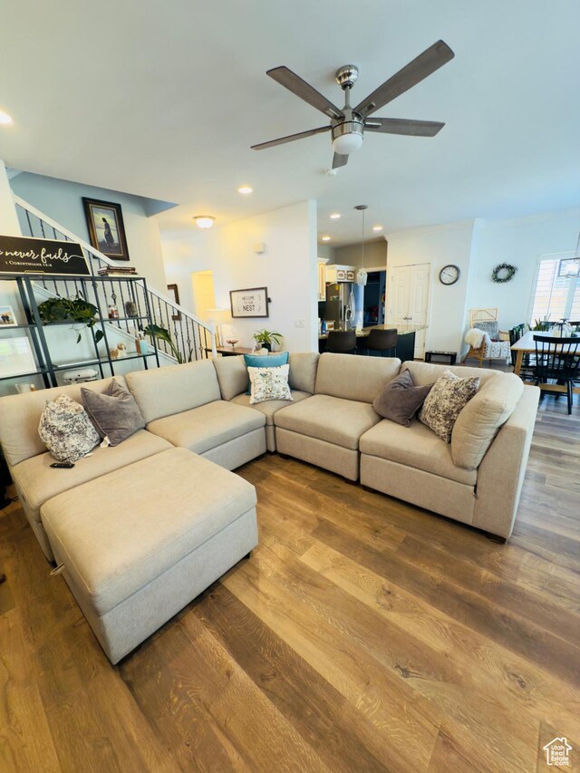 4382 N Pheasant Ridge Trl, Lehi, UT 84043 - living area featuring a ceiling fan, wood finished floors, stairs, and recessed lighting