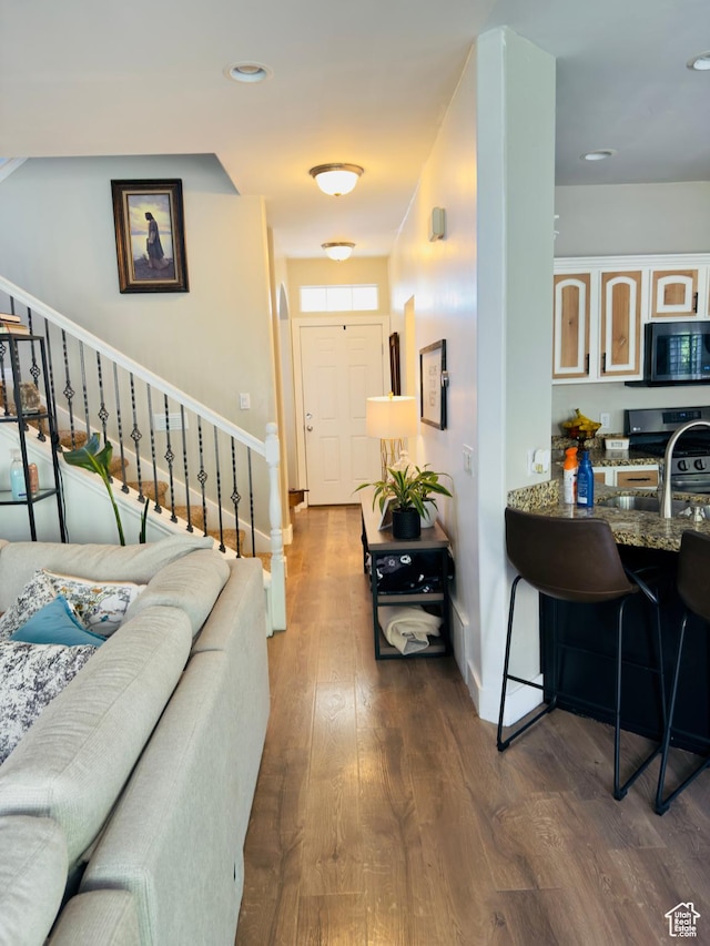 4382 N Pheasant Ridge Trl, Lehi, UT 84043 - living area with stairway, dark wood-style flooring, baseboards, and recessed lighting