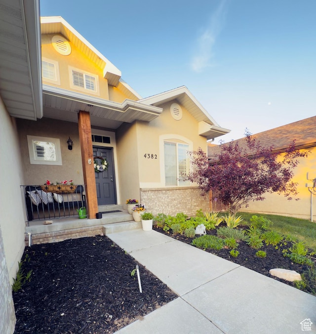 4382 N Pheasant Ridge Trl, Lehi, UT 84043 - property entrance with stucco siding and covered porch