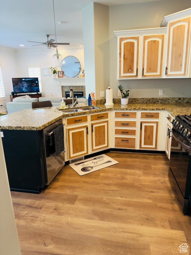 4382 N Pheasant Ridge Trl, Lehi, UT 84043 - kitchen with dishwasher, black range with gas stovetop, a sink, ceiling fan, and open floor plan