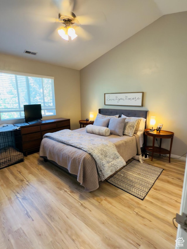 4382 N Pheasant Ridge Trl, Lehi, UT 84043 - bedroom featuring vaulted ceiling, light wood-style flooring, and a ceiling fan