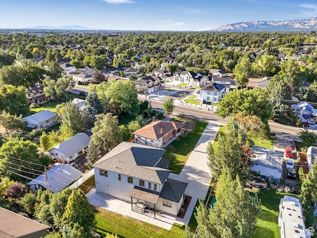aerial view of residential area with a mountainous background