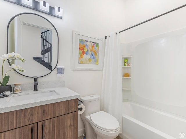 bathroom with toilet, shower / bath combo, and vanity