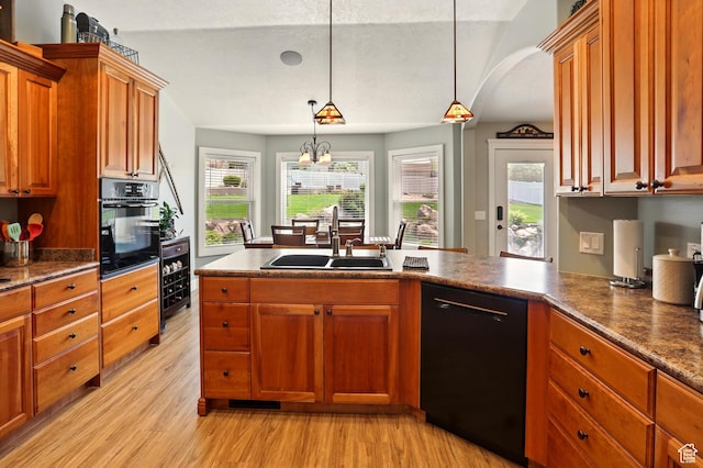 7639 S 475 W, Willard, UT 84340 - kitchen featuring black appliances, a sink, light wood-type flooring, decorative light fixtures, and wine cooler