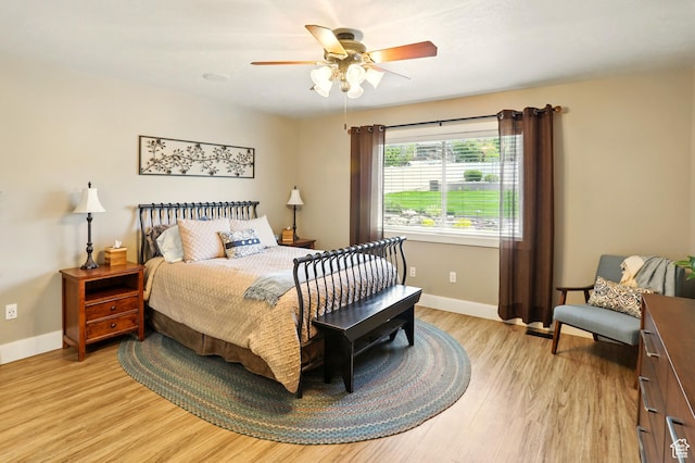 7639 S 475 W, Willard, UT 84340 - bedroom featuring baseboards, light wood-style flooring, and a ceiling fan