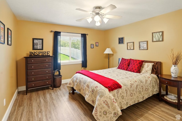 7639 S 475 W, Willard, UT 84340 - bedroom with wood finished floors, baseboards, and ceiling fan