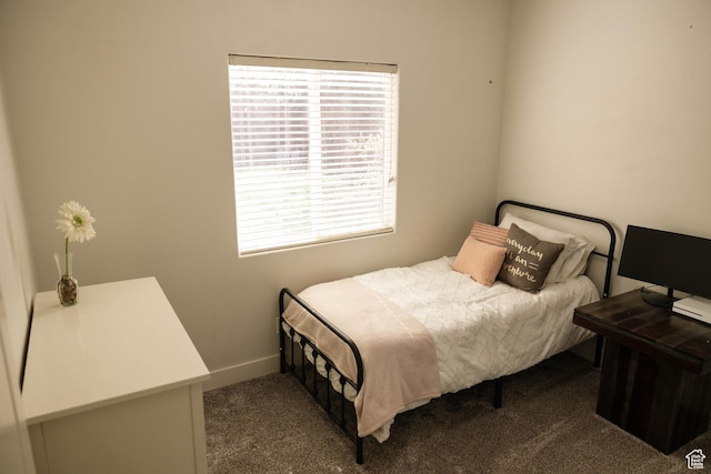 carpeted bedroom with baseboards