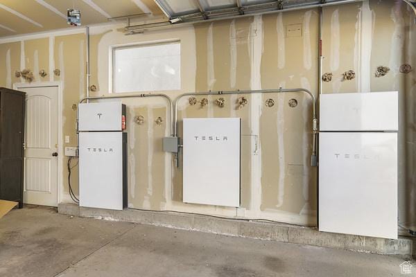 6966 N S Pass Rd, Eagle Mountain, UT 84005 - garage featuring freestanding refrigerator