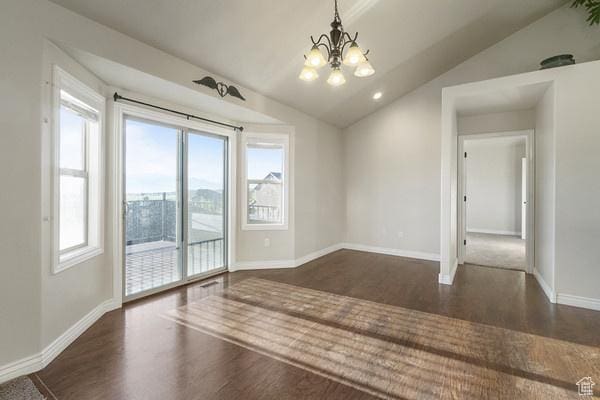 6966 N S Pass Rd, Eagle Mountain, UT 84005 - spare room featuring a chandelier, vaulted ceiling, baseboards, and dark wood-type flooring