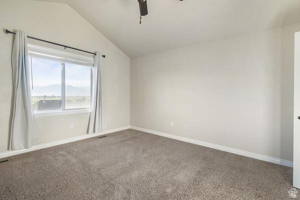 6966 N S Pass Rd, Eagle Mountain, UT 84005 - spare room featuring ceiling fan, carpet floors, vaulted ceiling, and baseboards
