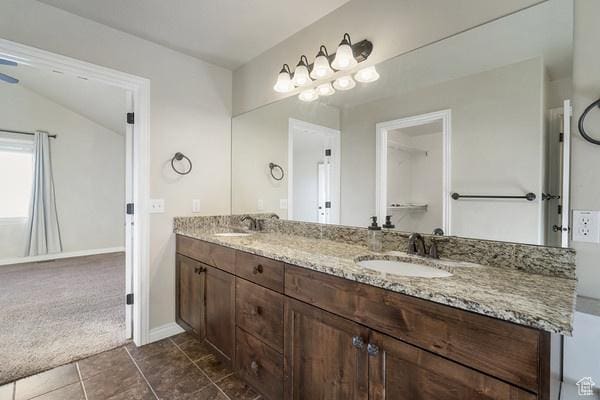 6966 N S Pass Rd, Eagle Mountain, UT 84005 - bathroom featuring double vanity, tile patterned floors, and baseboards