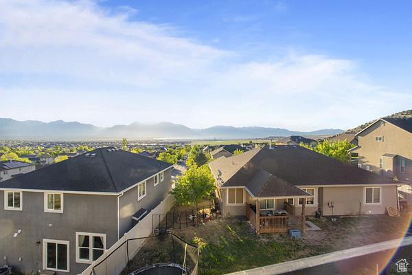 6966 N S Pass Rd, Eagle Mountain, UT 84005 - mountain view with nearby suburban area