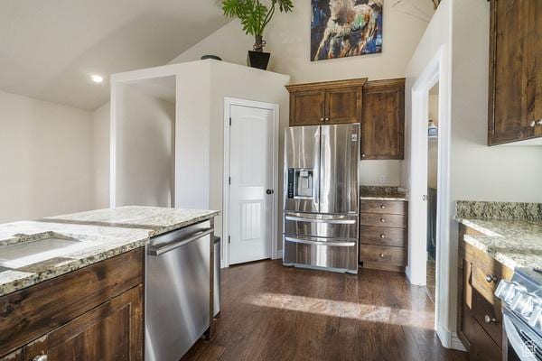 6966 N S Pass Rd, Eagle Mountain, UT 84005 - kitchen with stainless steel appliances, lofted ceiling, dark wood-type flooring, and light stone counters