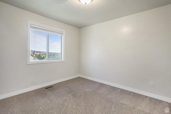 6966 N S Pass Rd, Eagle Mountain, UT 84005 - unfurnished room with carpet floors and baseboards