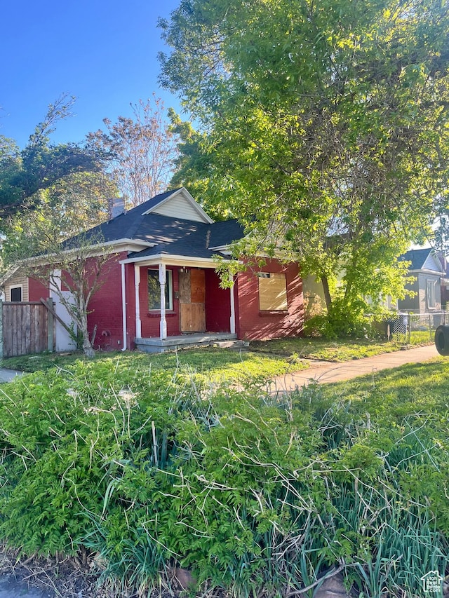 963 W 400 N, Salt Lake City, UT 84116 - view of front of property featuring fence and a chimney