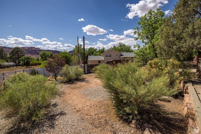 142 Hillside Dr, Moab, UT 84532 - view of yard with fence and a mountain view