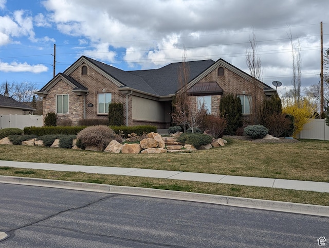 ranch-style home with brick siding