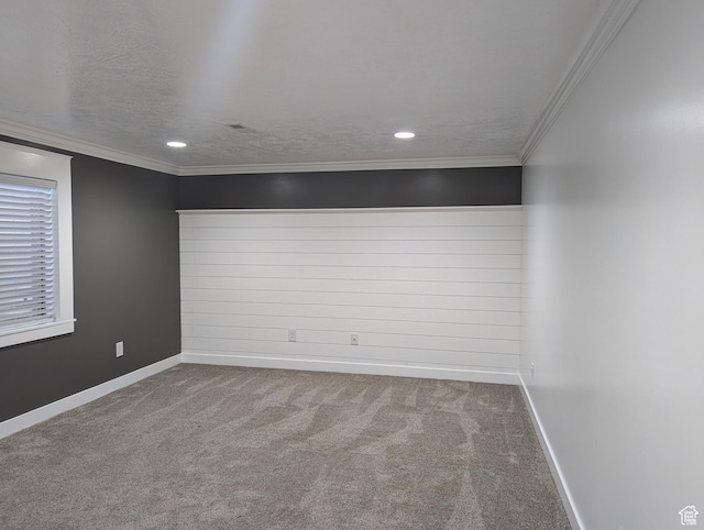 unfurnished room with carpet floors, baseboards, recessed lighting, and ornamental molding