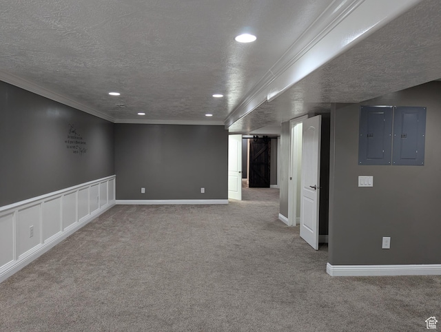 finished basement with recessed lighting, carpet, electric panel, a textured ceiling, and crown molding