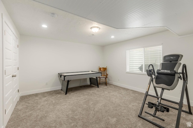 workout room with carpet flooring, baseboards, and recessed lighting