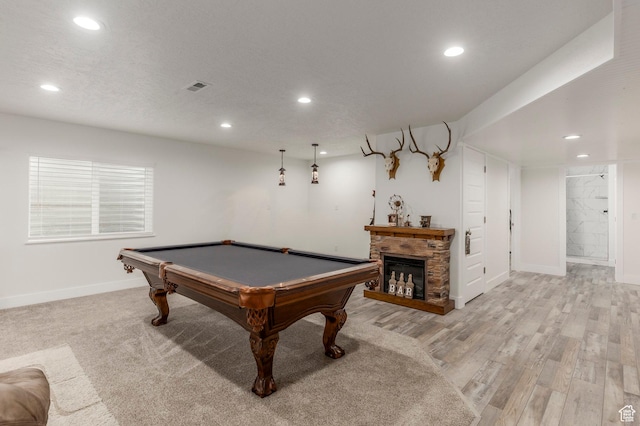 recreation room with recessed lighting, baseboards, billiards, light wood-style flooring, and a fireplace