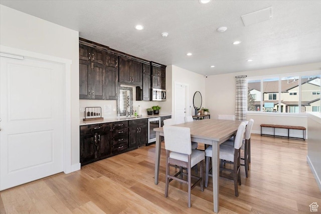 930 N 90 W, Santaquin, UT 84655 - dining area with wine cooler, light wood-style flooring, and recessed lighting