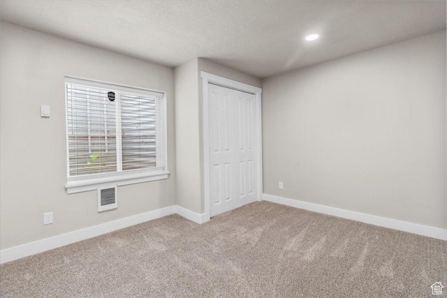 930 N 90 W, Santaquin, UT 84655 - unfurnished bedroom featuring carpet floors, baseboards, a closet, and recessed lighting