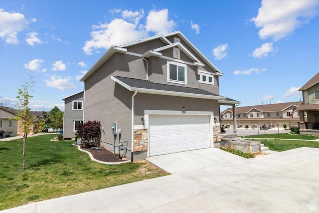 930 N 90 W, Santaquin, UT 84655 - view of front of property featuring stucco siding, an attached garage, a front lawn, concrete driveway, and stone siding