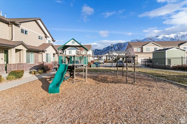 930 N 90 W, Santaquin, UT 84655 - view of playground featuring a residential view, a mountain view, and fence