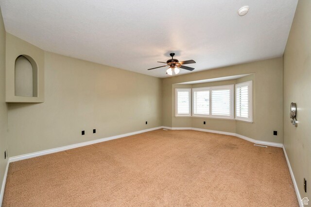 14046 S Emmeline Dr, Herriman, UT 84096 - empty room with ceiling fan, light carpet, and baseboards