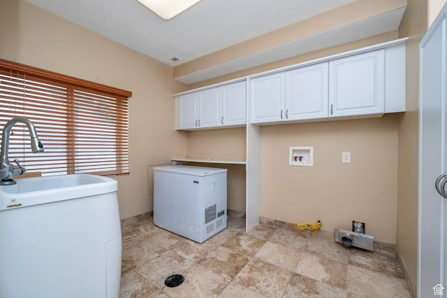 14046 S Emmeline Dr, Herriman, UT 84096 - washroom with cabinet space, light stone finish floors, hookup for a washing machine, and baseboards