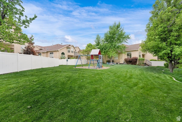 view of yard with a playground