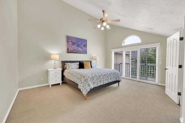 carpeted bedroom featuring access to outside, lofted ceiling, baseboards, and ceiling fan