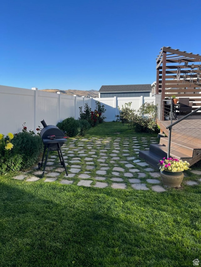 7747 N Seabiscuit Rd, Eagle Mountain, UT 84005 - view of yard featuring a patio area