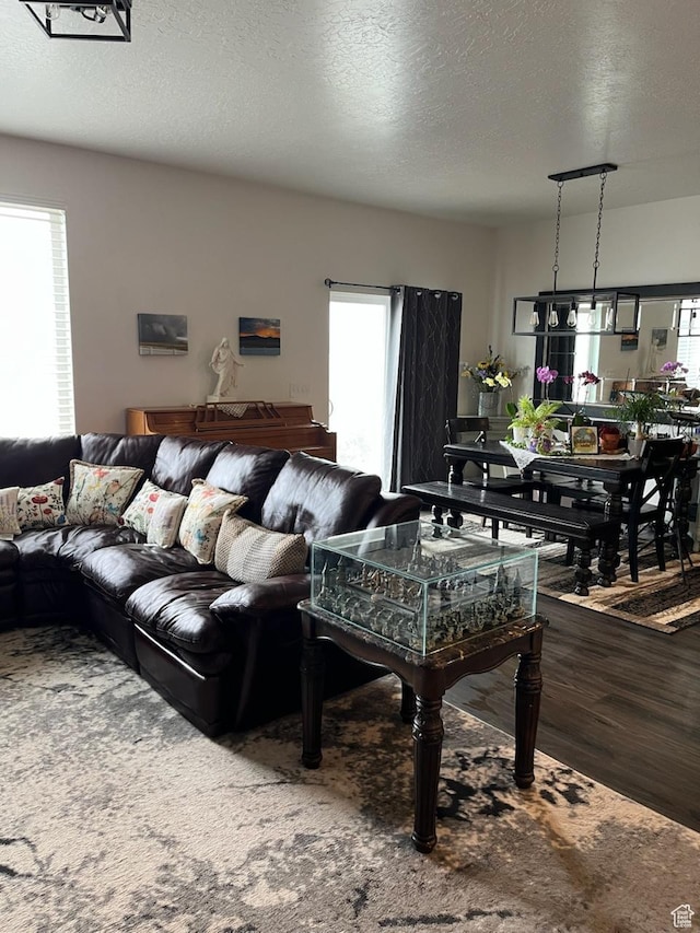 7747 N Seabiscuit Rd, Eagle Mountain, UT 84005 - living room with wood finished floors and a textured ceiling