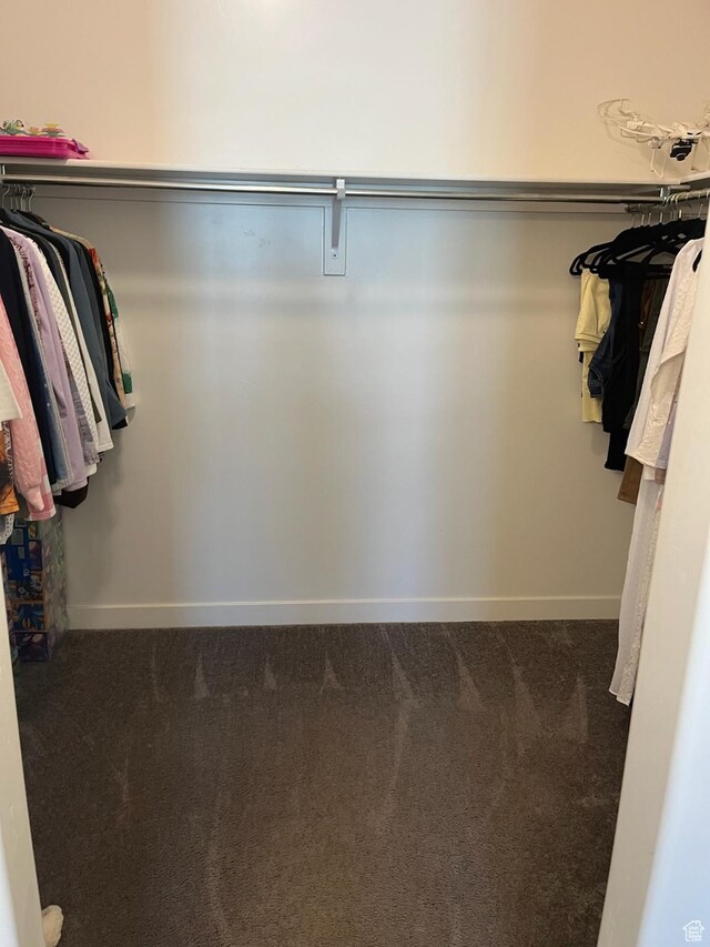 7747 N Seabiscuit Rd, Eagle Mountain, UT 84005 - walk in closet with dark carpet